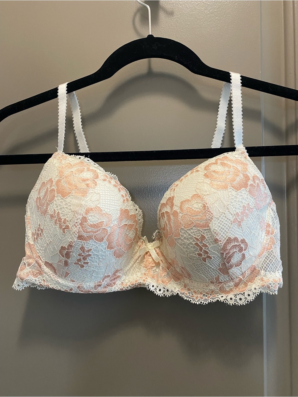 Never worn except to try on. Pretty ivory and pink Jezebel bra.  34D underwire